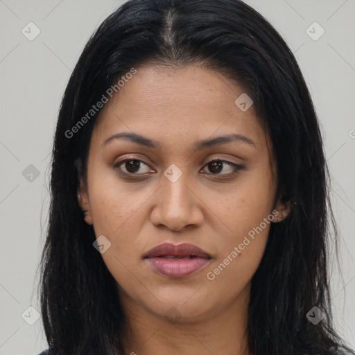 Joyful latino young-adult female with long  brown hair and brown eyes