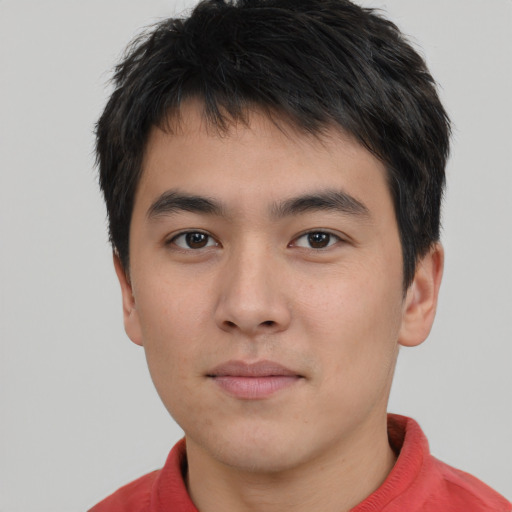 Neutral asian young-adult male with short  brown hair and brown eyes