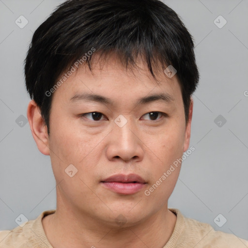 Neutral asian young-adult male with short  brown hair and brown eyes