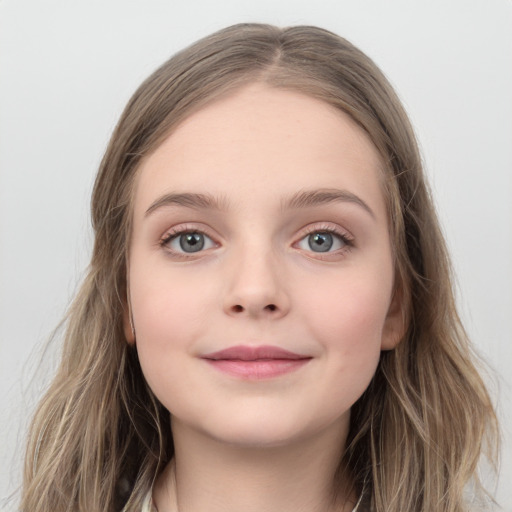 Joyful white child female with long  brown hair and grey eyes