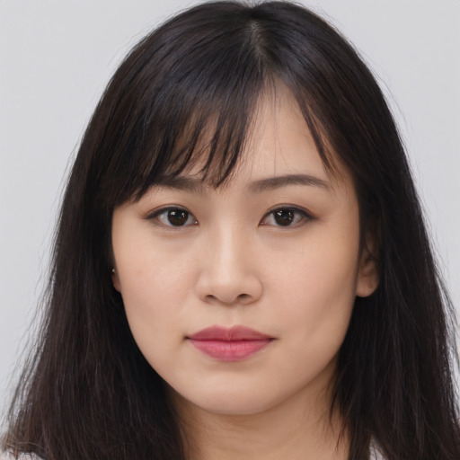 Neutral asian young-adult female with long  brown hair and brown eyes