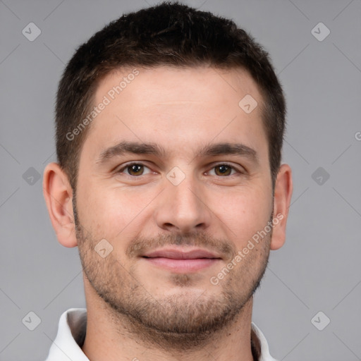 Joyful white young-adult male with short  brown hair and brown eyes