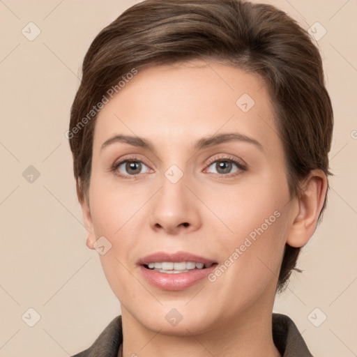 Joyful white young-adult female with short  brown hair and grey eyes