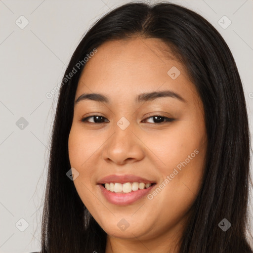 Joyful white young-adult female with long  brown hair and brown eyes