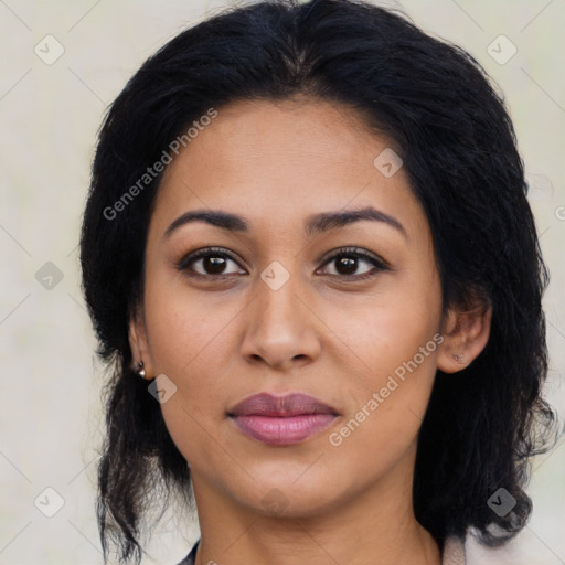 Joyful latino young-adult female with medium  black hair and brown eyes