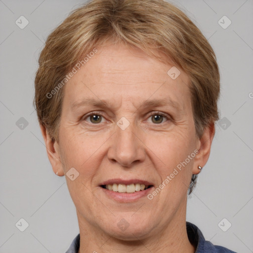 Joyful white adult female with short  brown hair and grey eyes