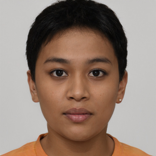 Neutral latino young-adult female with short  brown hair and brown eyes