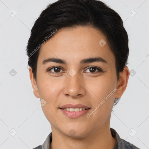 Joyful white young-adult female with short  brown hair and brown eyes