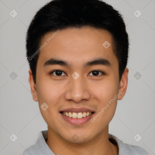 Joyful white young-adult male with short  black hair and brown eyes