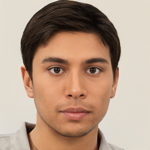 Neutral asian young-adult male with short  brown hair and brown eyes