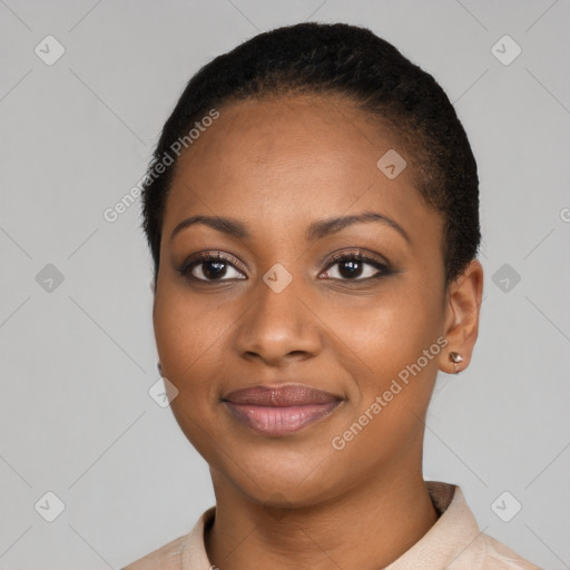 Joyful black young-adult female with short  black hair and brown eyes