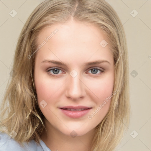 Joyful white young-adult female with long  brown hair and blue eyes