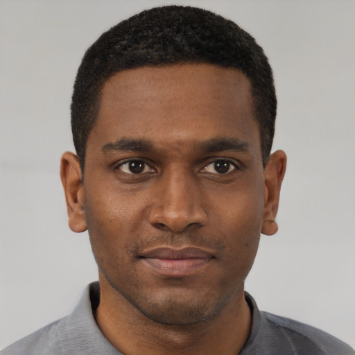 Neutral black young-adult male with short  black hair and brown eyes