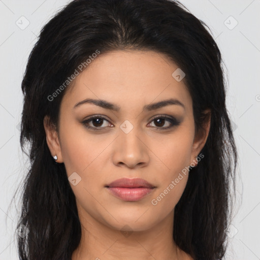 Joyful latino young-adult female with long  brown hair and brown eyes