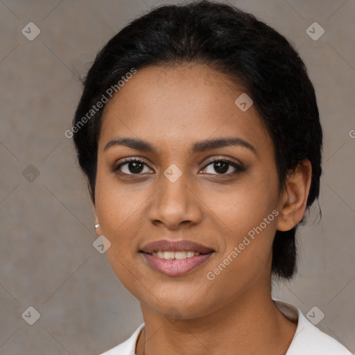 Joyful latino young-adult female with medium  black hair and brown eyes