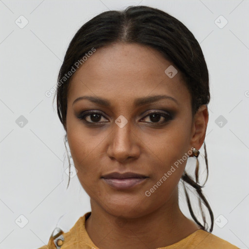 Joyful latino young-adult female with long  brown hair and brown eyes