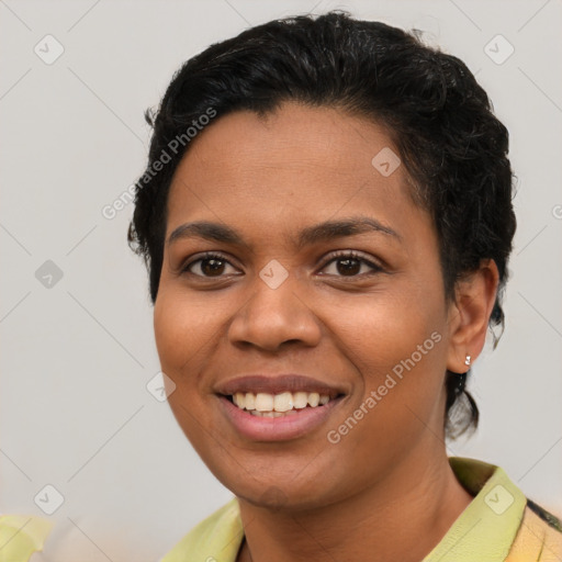 Joyful latino young-adult female with short  brown hair and brown eyes