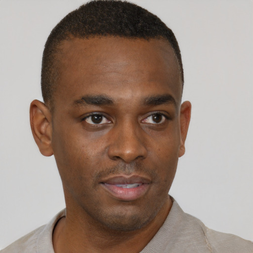 Neutral black young-adult male with short  brown hair and brown eyes