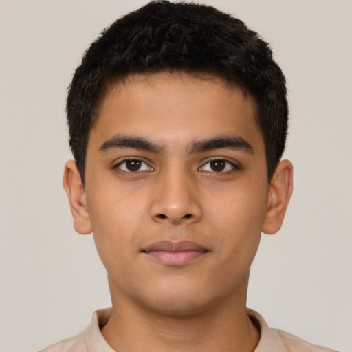 Neutral latino young-adult male with short  black hair and brown eyes