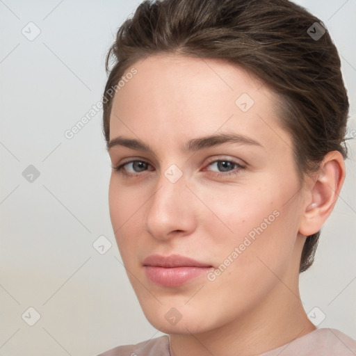 Neutral white young-adult female with short  brown hair and brown eyes