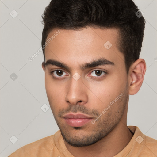 Neutral white young-adult male with short  brown hair and brown eyes