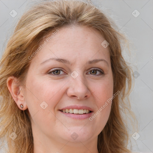 Joyful white young-adult female with medium  brown hair and blue eyes