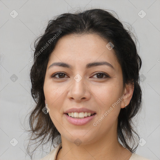 Joyful latino young-adult female with medium  brown hair and brown eyes