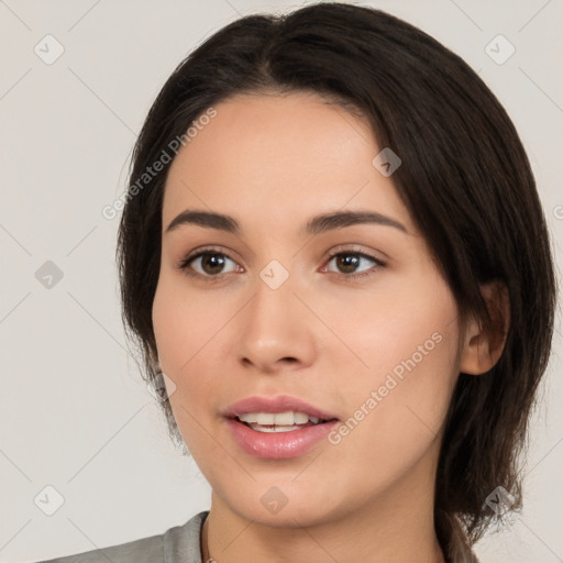 Neutral white young-adult female with medium  brown hair and brown eyes