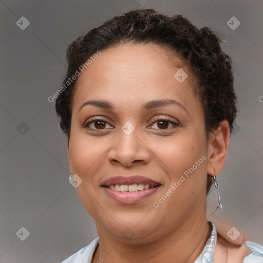 Joyful latino young-adult female with short  brown hair and brown eyes