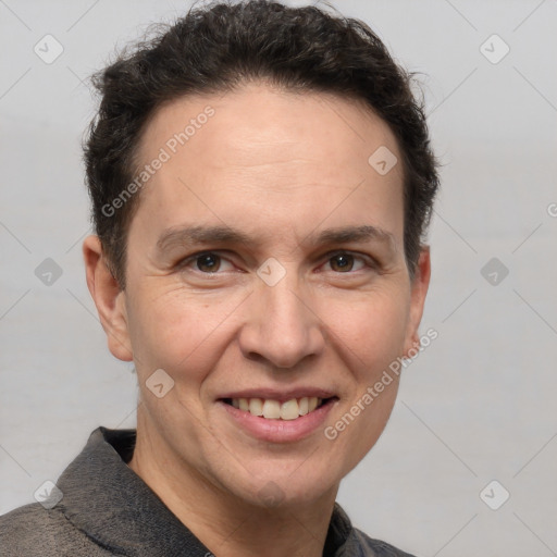 Joyful white adult male with short  brown hair and grey eyes