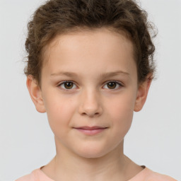 Joyful white child female with short  brown hair and brown eyes