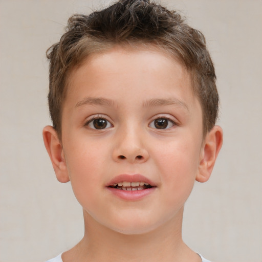 Joyful white child male with short  brown hair and brown eyes