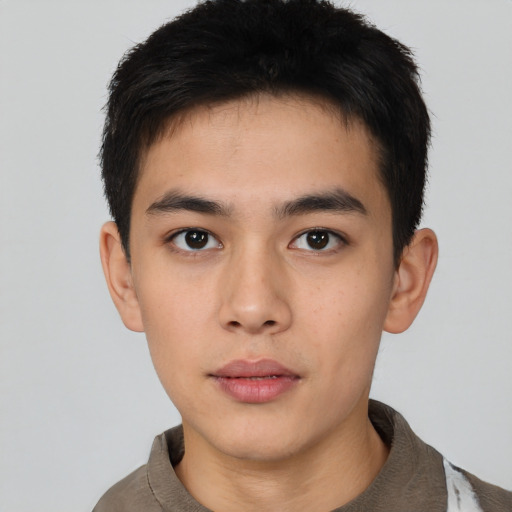 Neutral asian young-adult male with short  brown hair and brown eyes