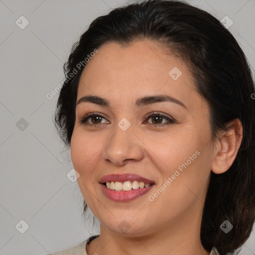 Joyful white young-adult female with medium  brown hair and brown eyes