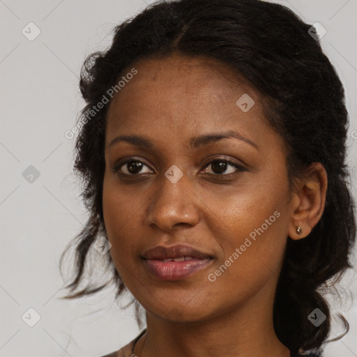 Joyful black young-adult female with medium  brown hair and brown eyes