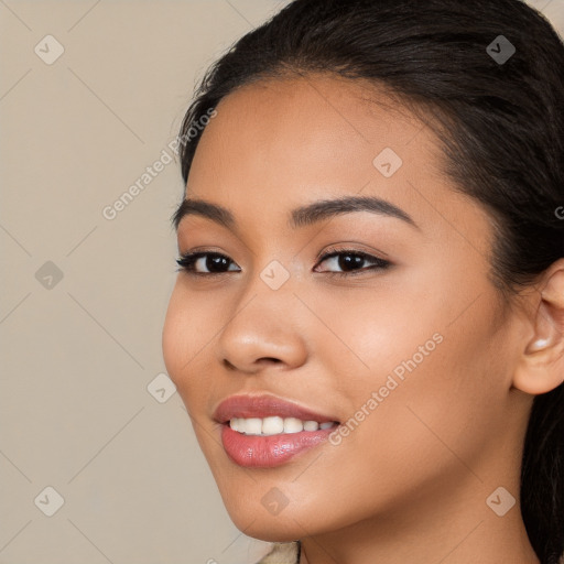 Joyful latino young-adult female with long  brown hair and brown eyes