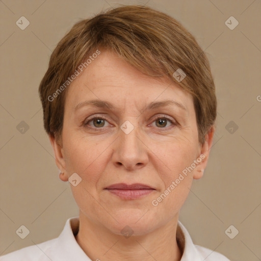 Joyful white adult female with short  brown hair and brown eyes