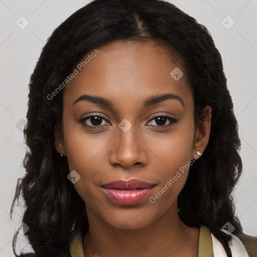 Joyful black young-adult female with long  brown hair and brown eyes