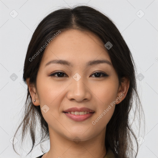 Joyful asian young-adult female with medium  brown hair and brown eyes