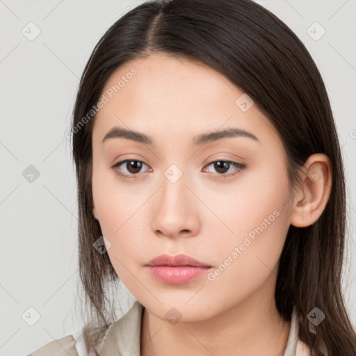 Neutral white young-adult female with long  brown hair and brown eyes