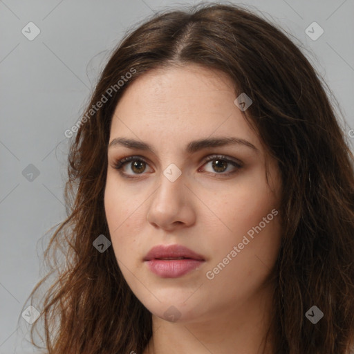 Neutral white young-adult female with long  brown hair and brown eyes