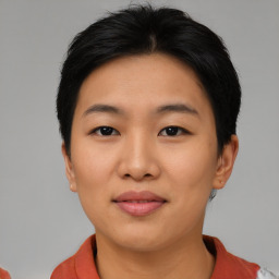 Joyful asian young-adult female with short  black hair and brown eyes