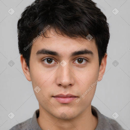 Neutral white young-adult male with short  brown hair and brown eyes