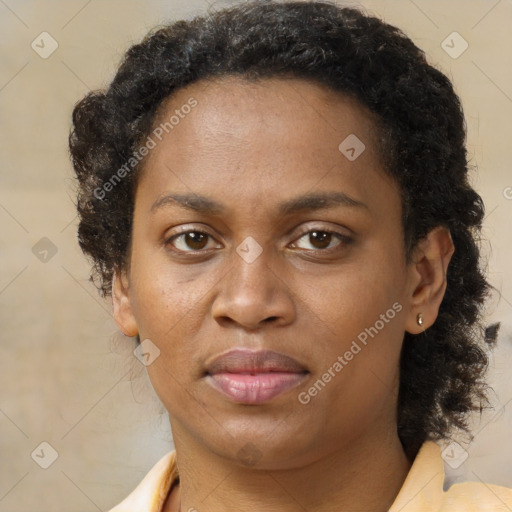 Neutral black adult female with short  brown hair and brown eyes