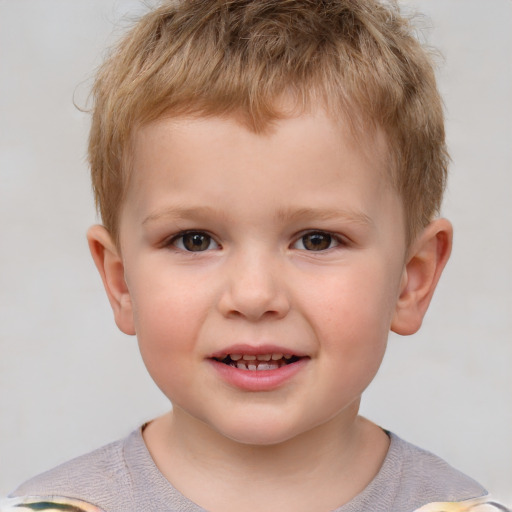 Joyful white child male with short  brown hair and brown eyes