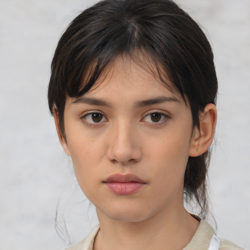 Neutral asian young-adult female with medium  brown hair and brown eyes
