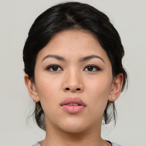 Neutral asian young-adult female with medium  black hair and brown eyes