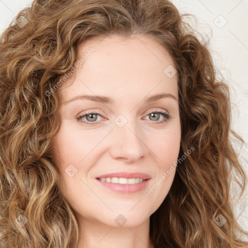 Joyful white young-adult female with long  brown hair and green eyes