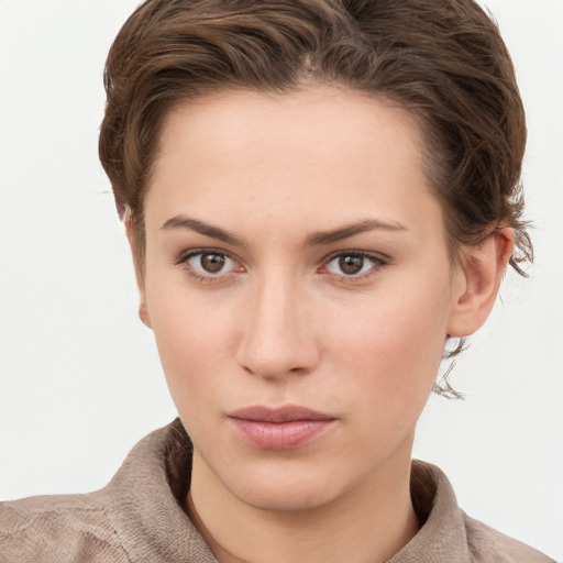 Neutral white young-adult female with short  brown hair and grey eyes