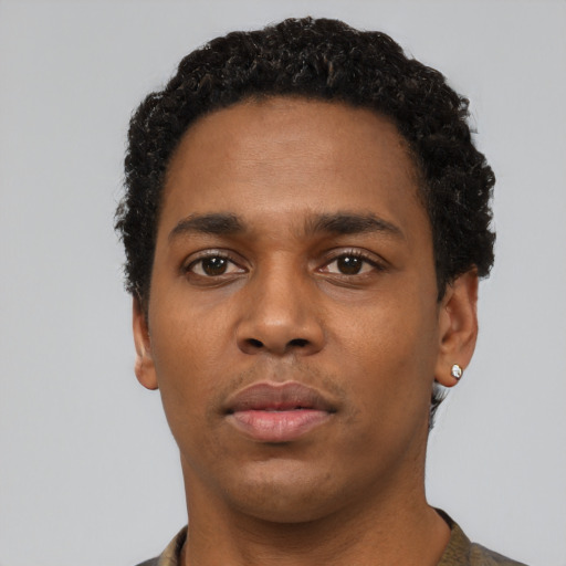 Neutral black young-adult male with short  black hair and brown eyes